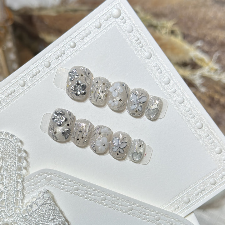 Decorative Press-On Nail Art Set with Floral and Star Accents Stornfield