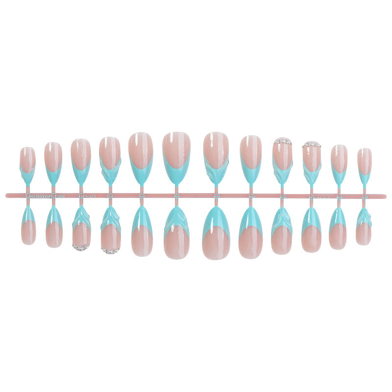 Acrylic nail set with elegant color design and glitter accents Stornfield