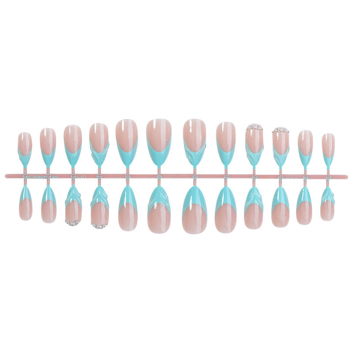 Acrylic nail set with elegant color design and glitter accents Stornfield