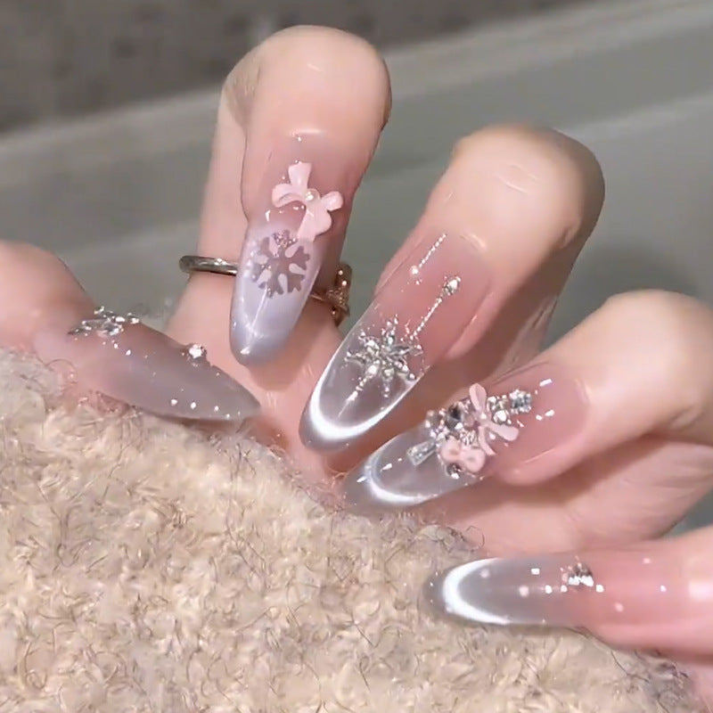 Artificial nail set with festive gift design and elegant glitter accents Stornfield