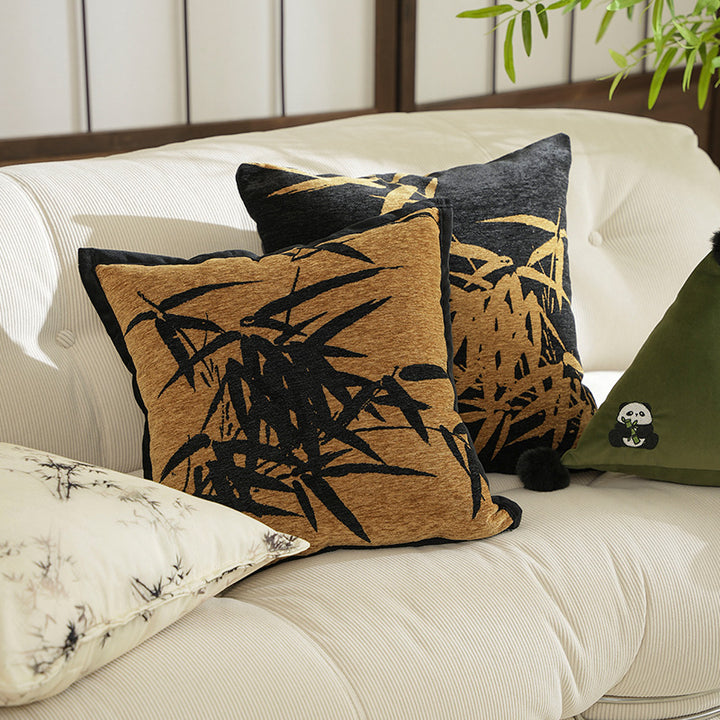Decorative velvet cushion with embroidered bamboo motif and piping