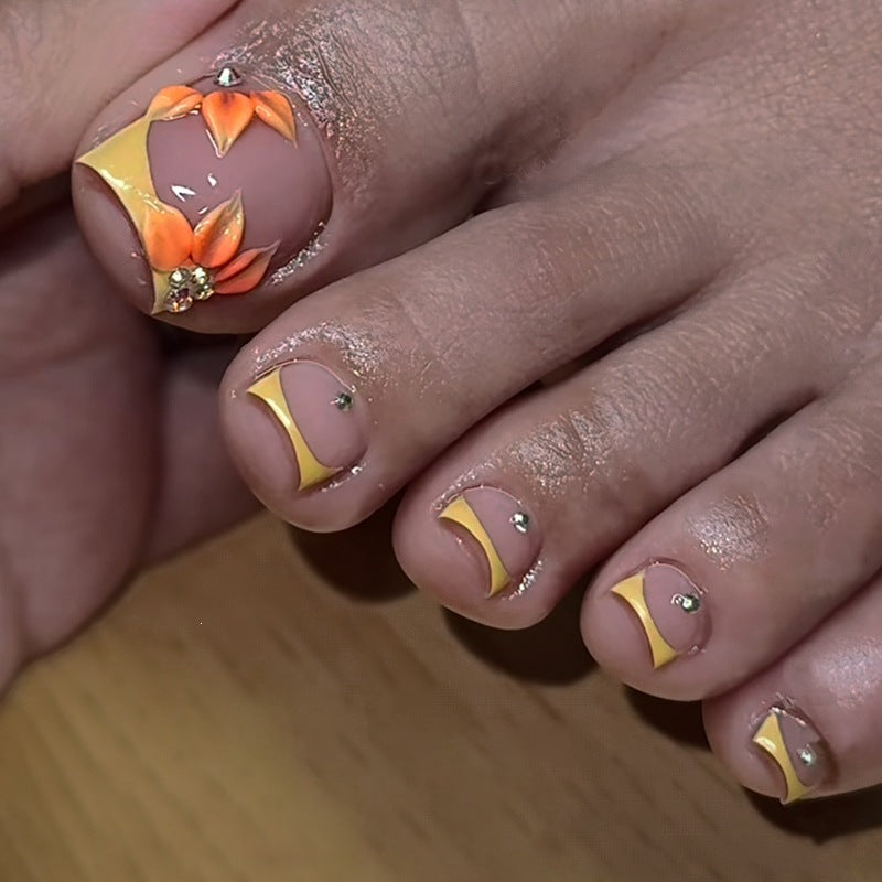 Artificial nail set with floral design and elegant accents Stornfield