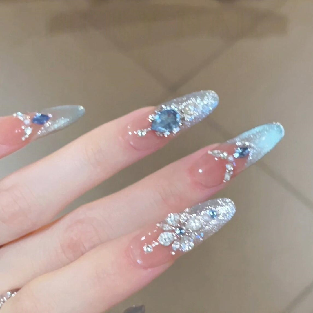 Glamorous artificial nails with sparkling rhinestone accents Stornfield