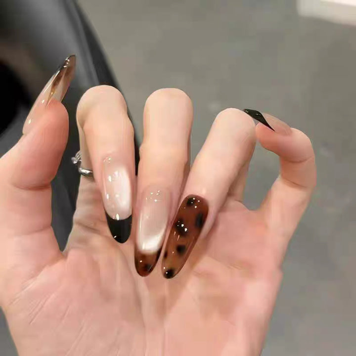 Artificial nails with elegant ombre design and delicate accents Stornfield