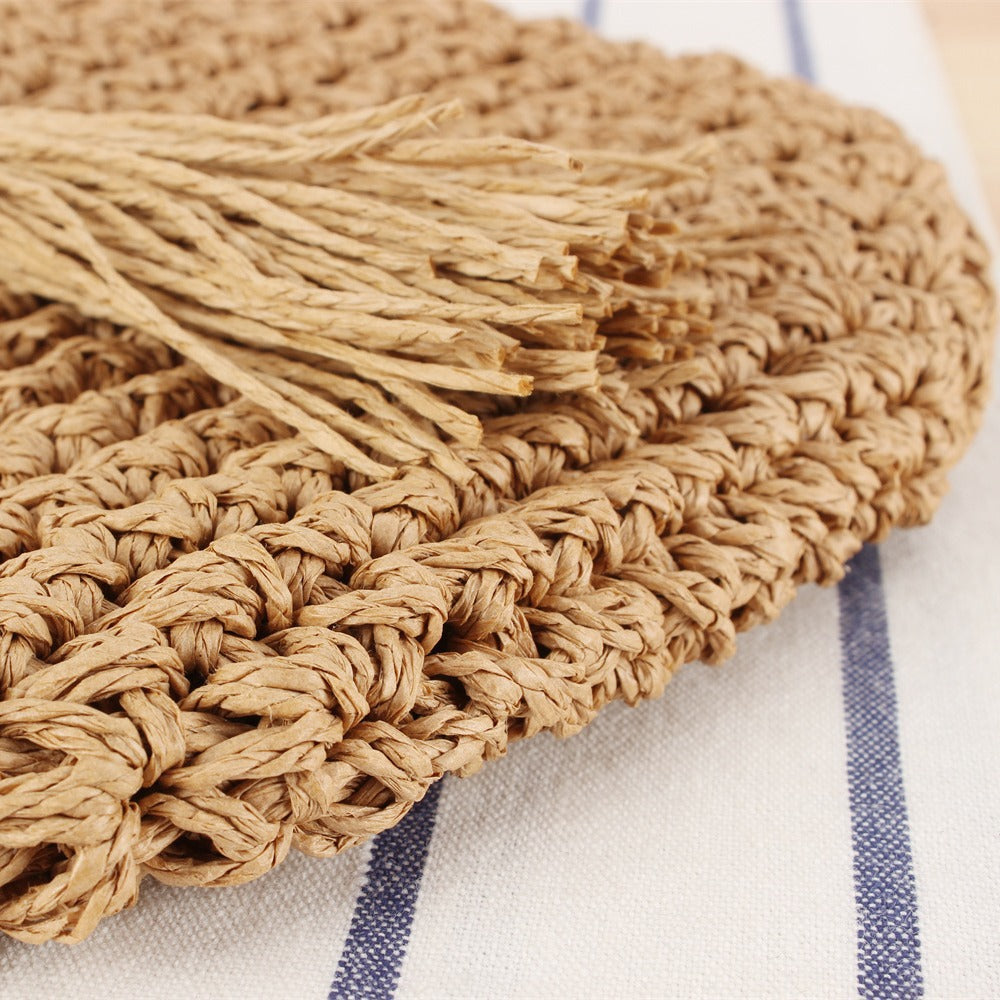 Braided shoulder bag with tassels and wooden decorations Stornfield