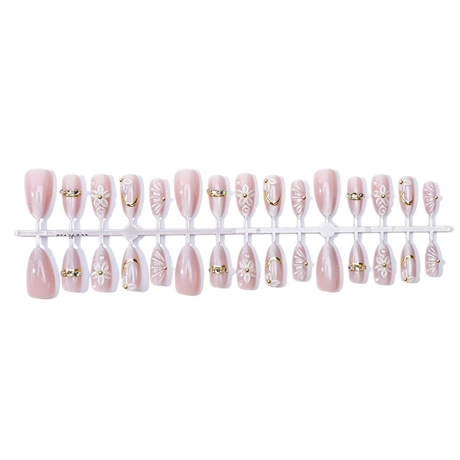 Elegant artificial nail set with floral and glitter elements Stornfield