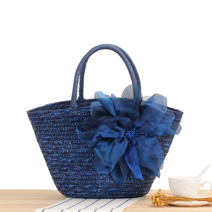 Elegant straw bag with floral accents Stornfield