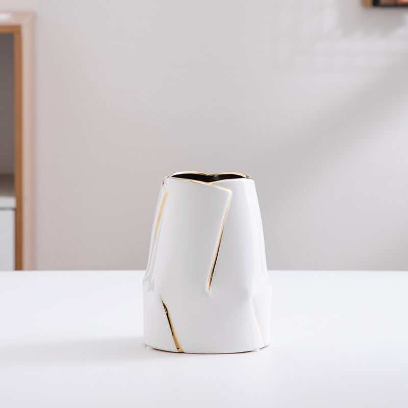 Decorative ceramic vase with golden accents Stornfield
