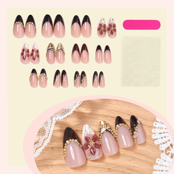 Acrylic nail set with elegant flower and glitter accent Stornfield