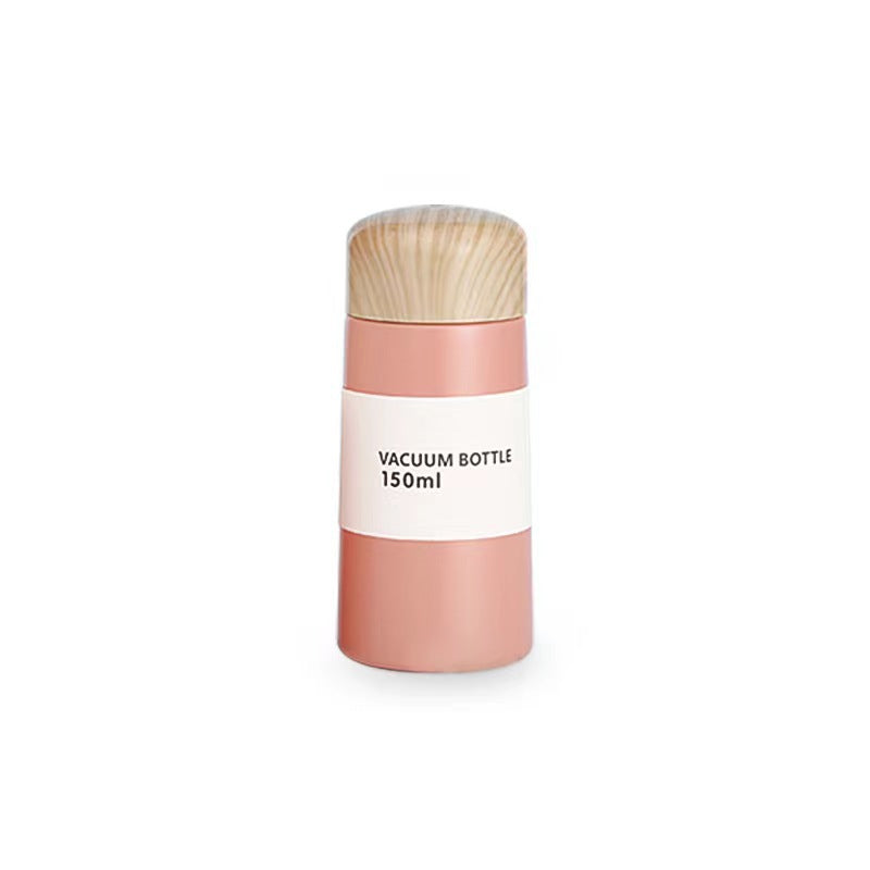 Women vacuum-insulated water bottle with innovative wooden lid Stornfield