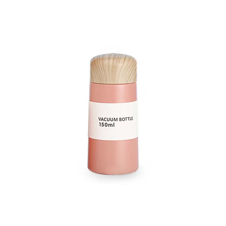 Women vacuum-insulated water bottle with innovative wooden lid Stornfield