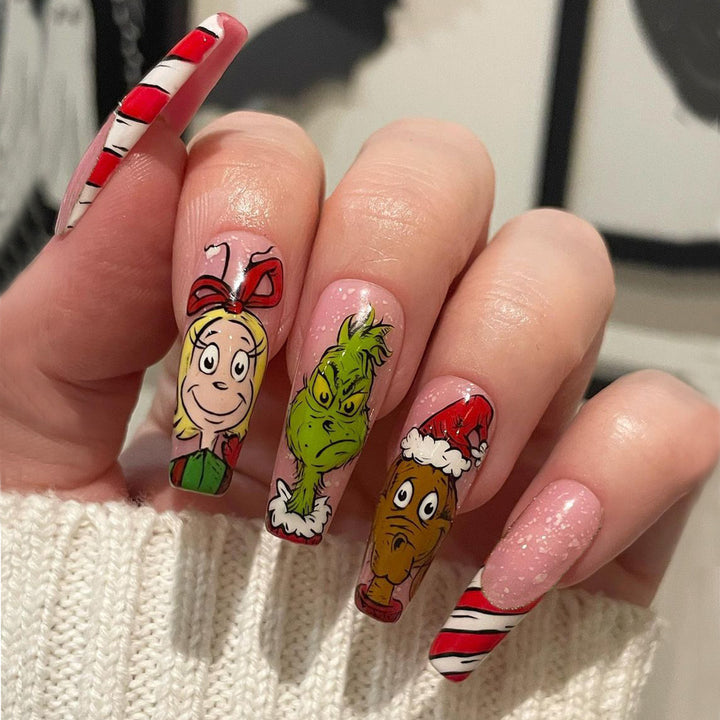 Artificial nail set with festive motifs and charming Grinch design Stornfield