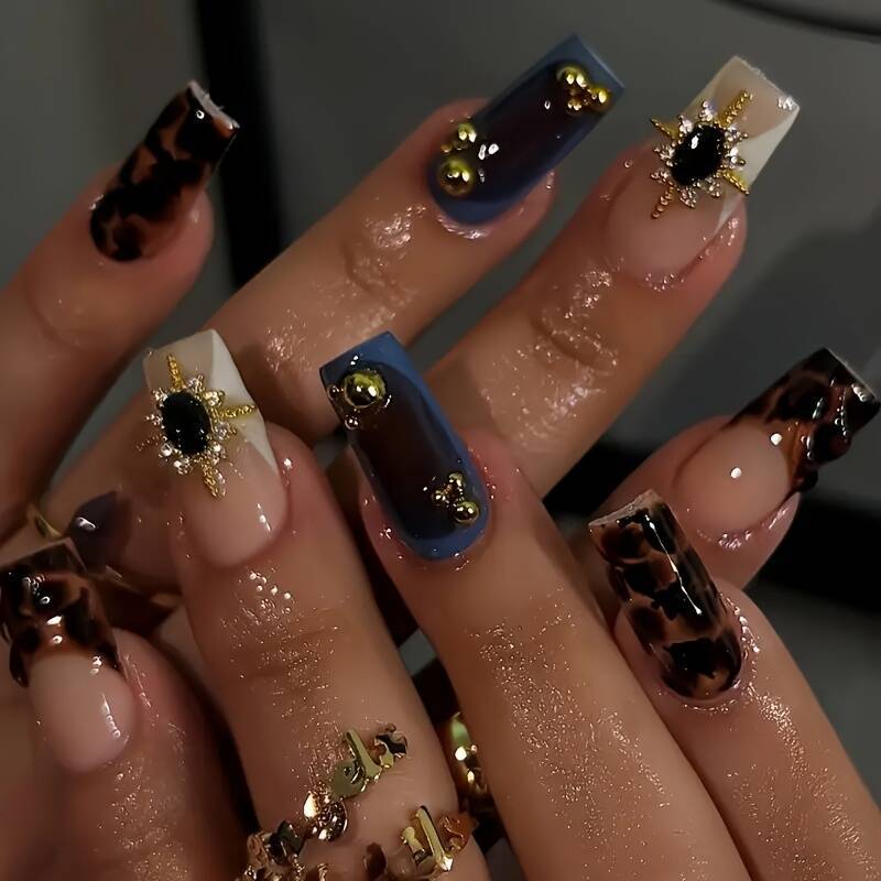 Artistic Patterned Press-On Nail Set with Decorative Elements Stornfield