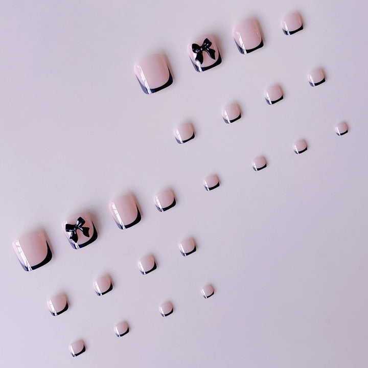 Artificial nail set with elegant bow accents Stornfield