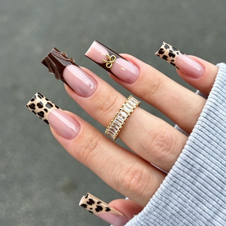 Nail set with stylish leopard pattern and elegant accents Stornfield