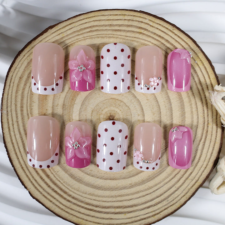 Artificial nail set with playful flower and dot motif Stornfield