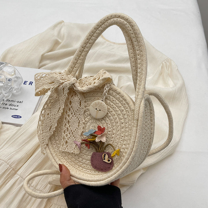 Handcrafted Floral Accent Straw Bag