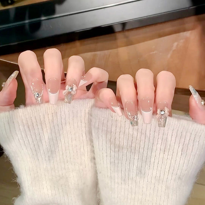 Glamorous artificial nails with glitter design Stornfield