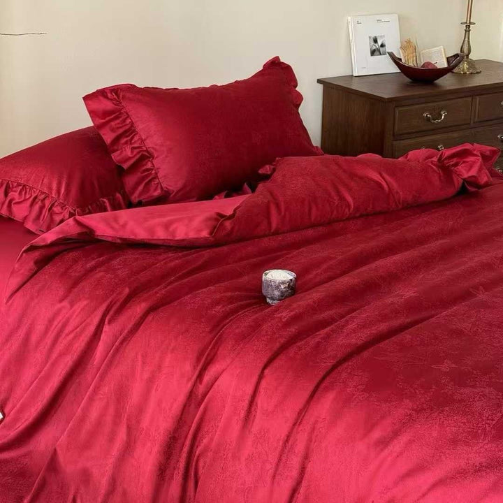 Ruffled Jacquard Cotton Duvet Cover Set with Embossed Floral Motif and Matching Pillow Shams
