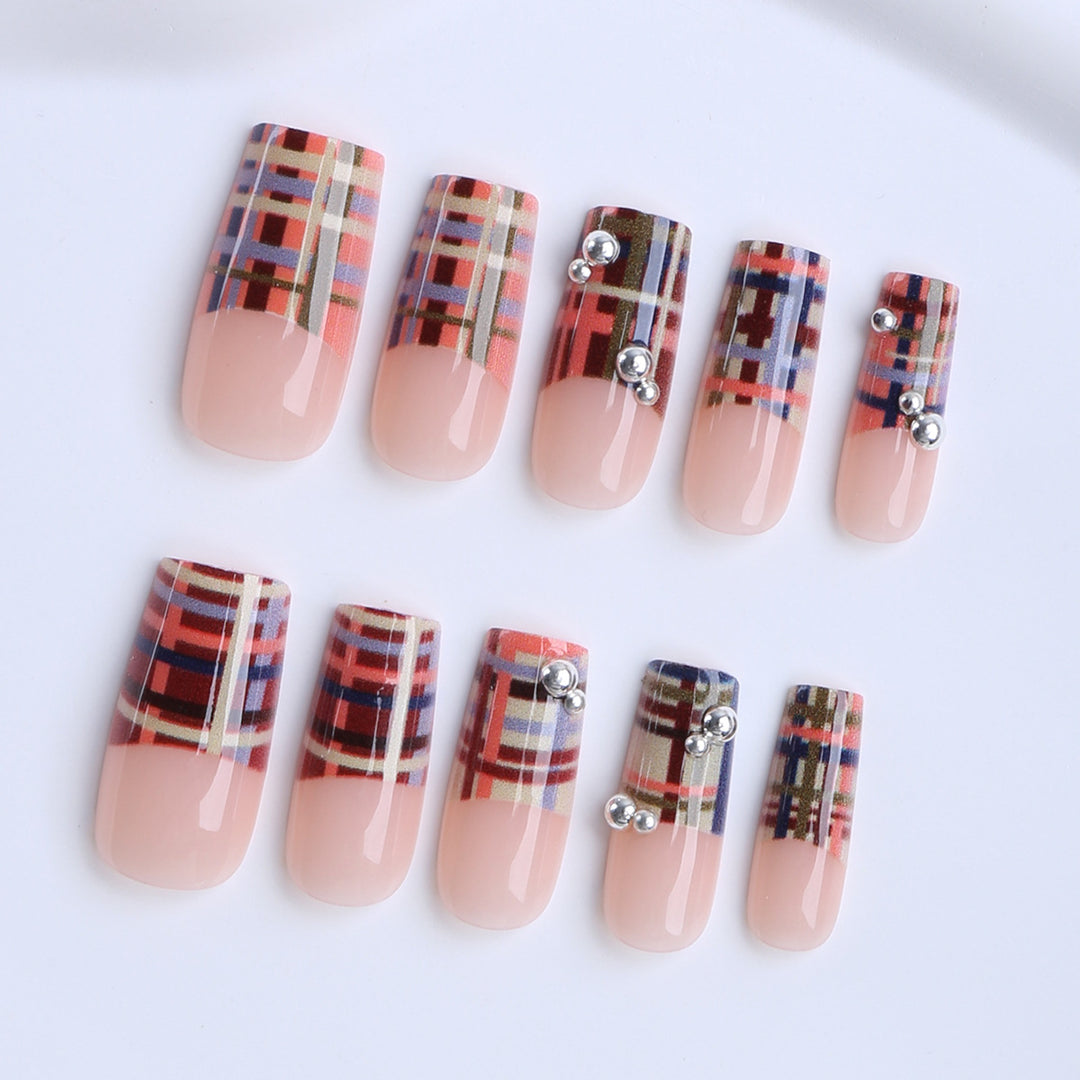 Artificial nails with geometric patterns and glossy accents Stornfield