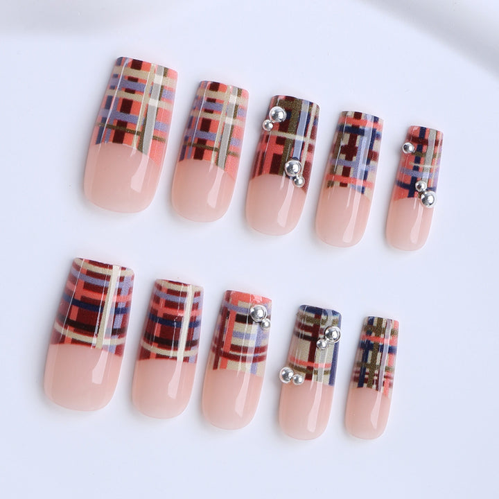 Artificial nails with geometric patterns and glossy accents Stornfield