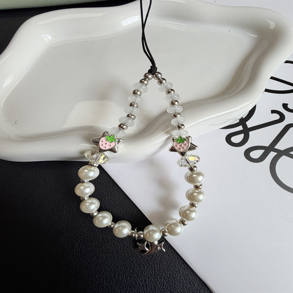 Playful Pearl and Charm Exaggerated Necklace Stornfield