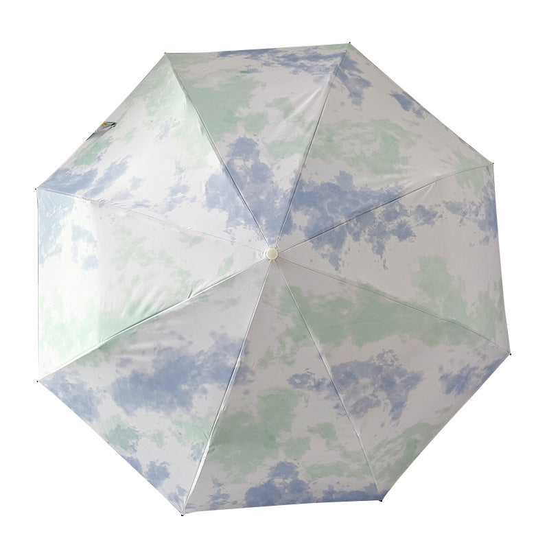 Ladies elegant folding umbrella with modern cloud pattern Stornfield