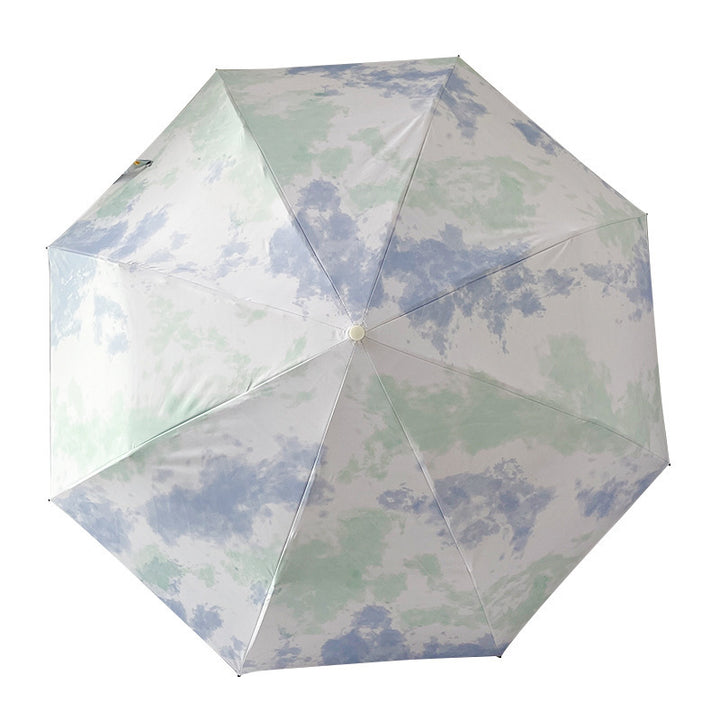 Ladies elegant folding umbrella with modern cloud pattern Stornfield