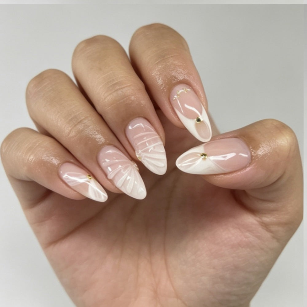 Artificial nails with elegant flower design and glitter accents Stornfield