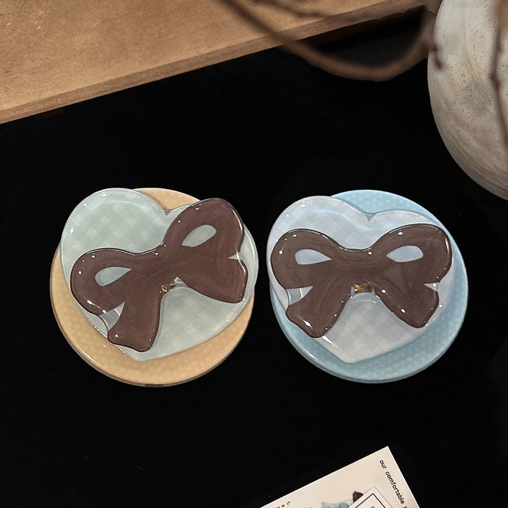 Decorative ceramic coaster with bow motif Stornfield