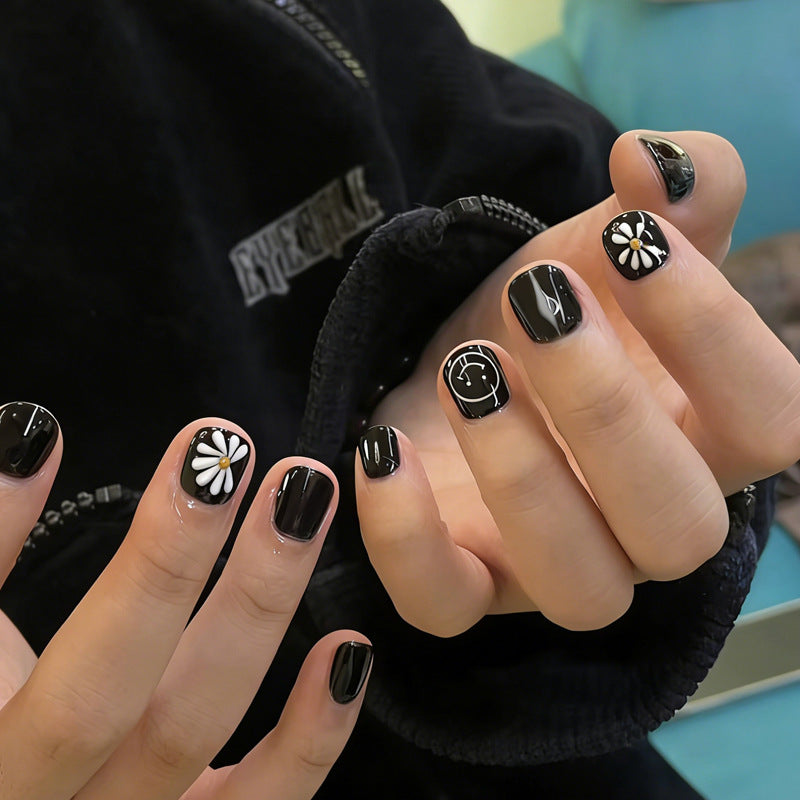 Nail art set with creative flower and clock designs Stornfield