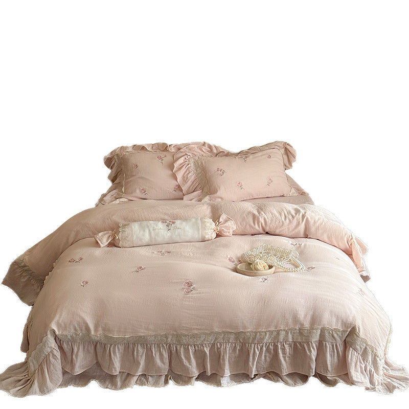 Romantic bedding set made of linen-cotton blend with ruffles and floral embroidery