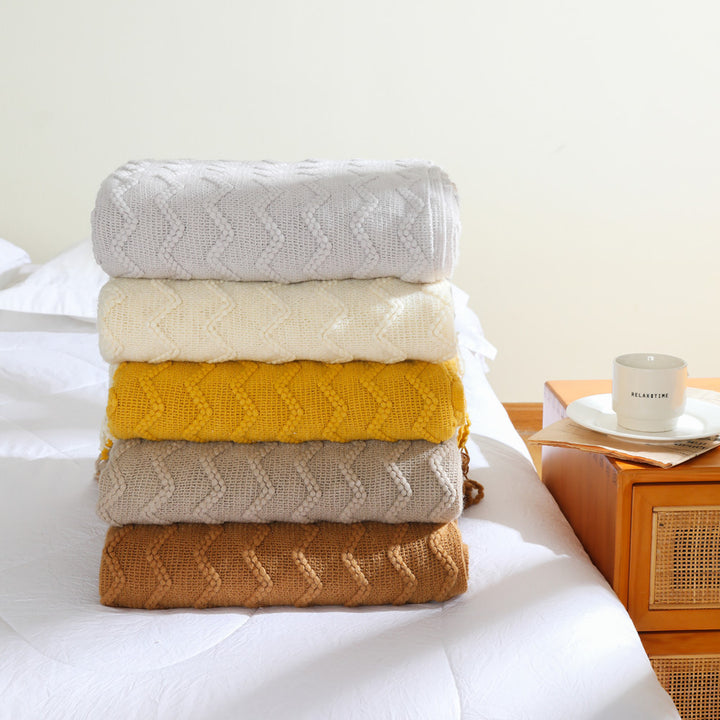 Women’s knitted blanket with textured wave pattern Stornfield