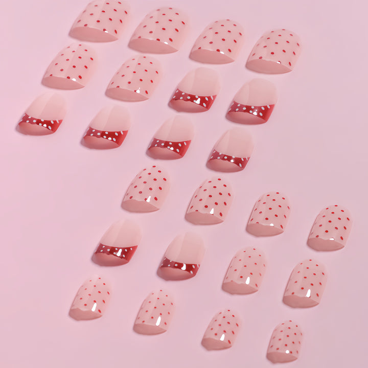 Stylish Press-On Nail Design with Polka Dot and French Tip Accents Stornfield