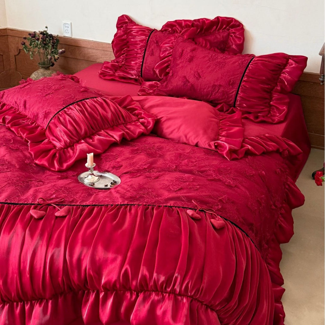Opulentes Satin Bedding Set with Ruffle Trim, Jacquard Texture and Heart Appliqué