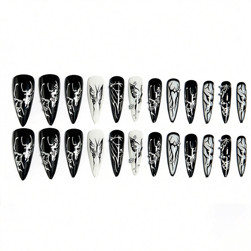 Artificial nail set with elegant geometric designs and creative metallic accents Stornfield