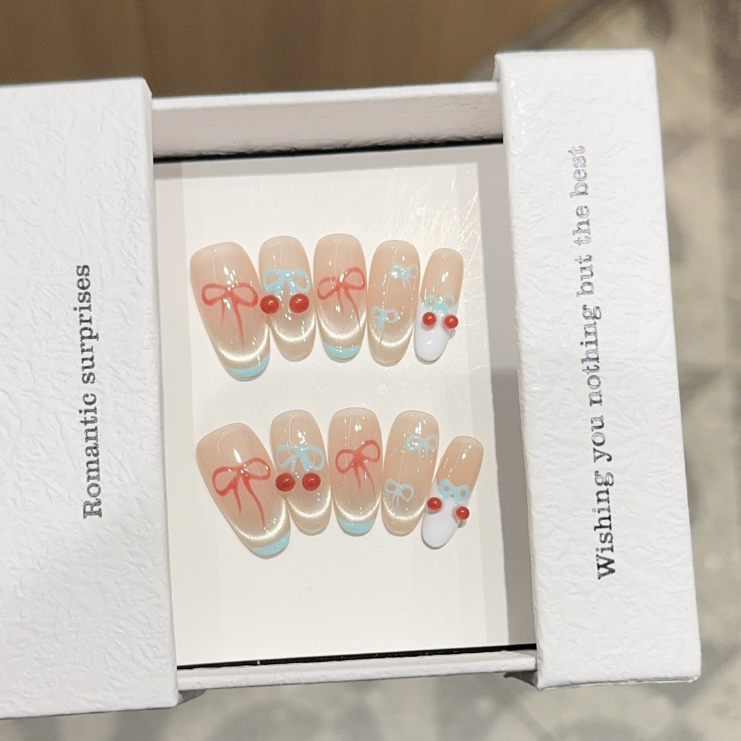 Artificial nail tips with romantic bow and cherry motifs Stornfield