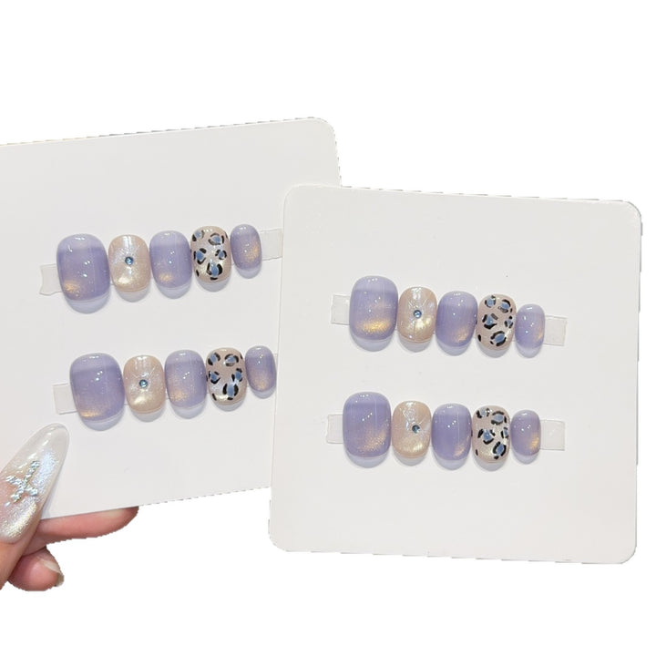 Glamorous artificial nails with elegant glitter elements Stornfield