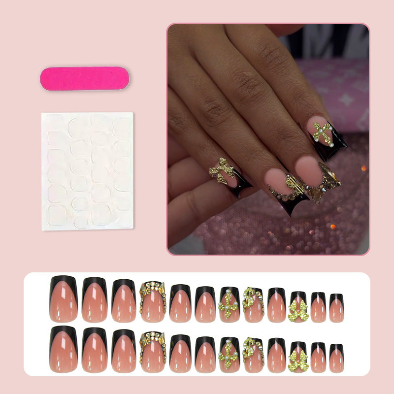 Artificial nails with elegant gold decorations and stylish black Stornfield