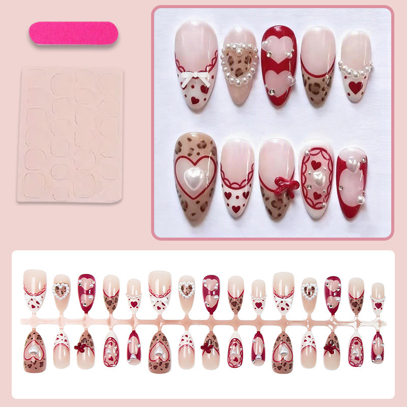 Nail set with romantic heart and bow decorations Stornfield