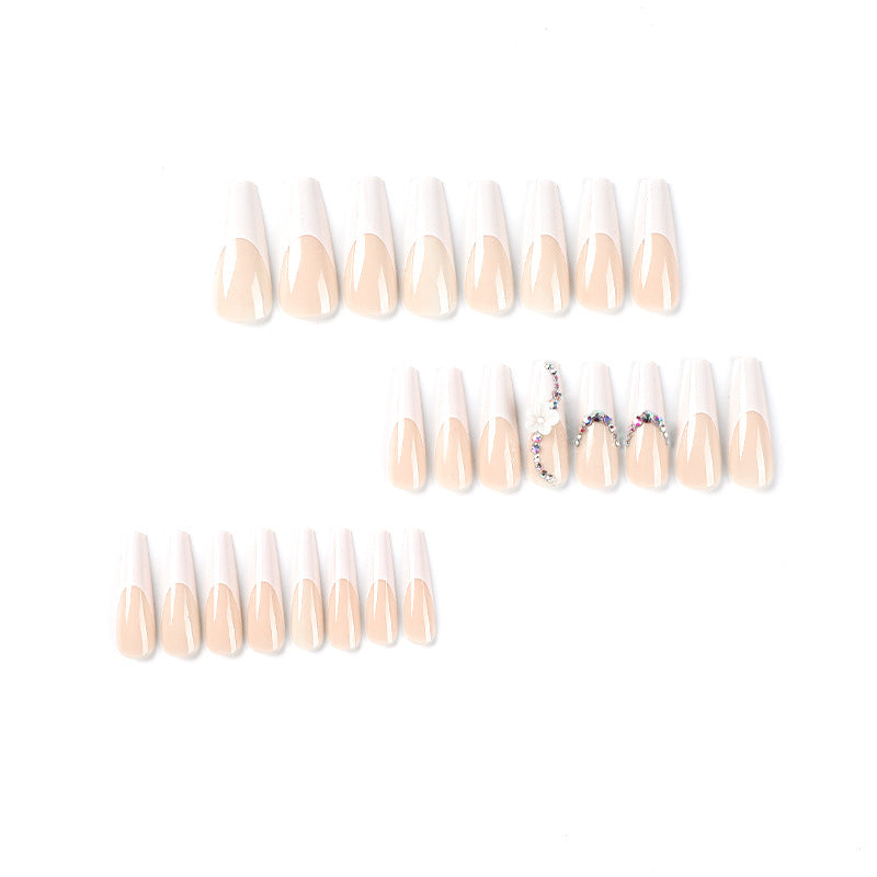 Creative artificial nails with elegant rhinestone and floral accents Stornfield