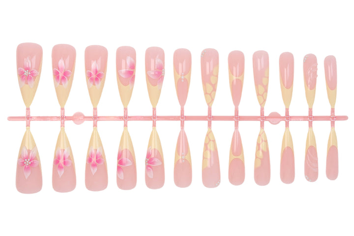 Acrylic nail set with elegant floral pattern and shimmering accents Stornfield