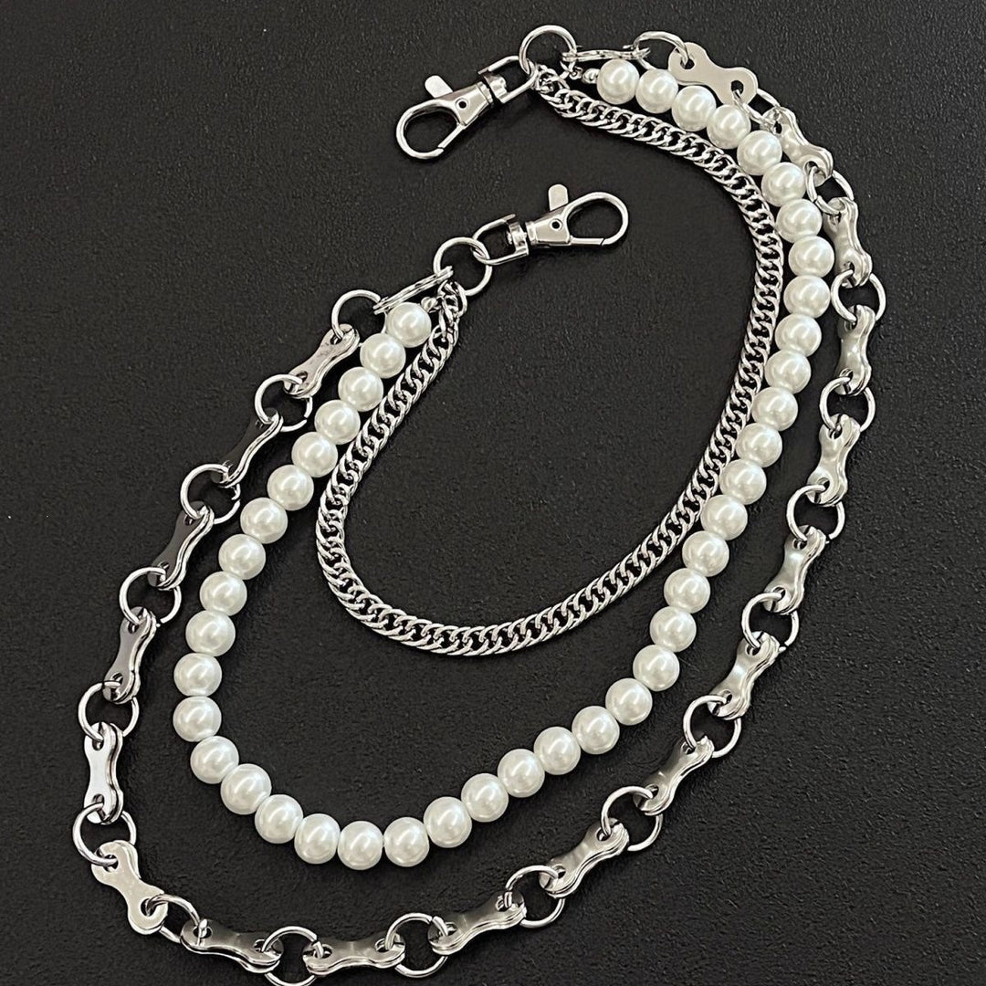 Fashionable chain bracelet with pearls and metal links Stornfield