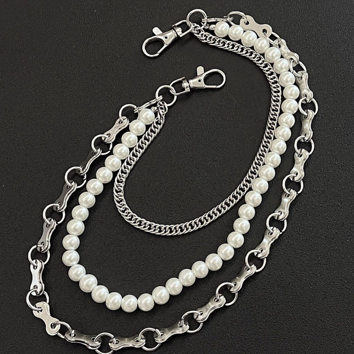 Fashionable chain bracelet with pearls and metal links Stornfield