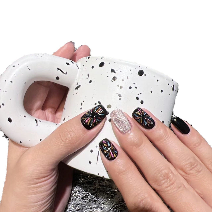 Artificial nails with glitter and floral patterns Stornfield