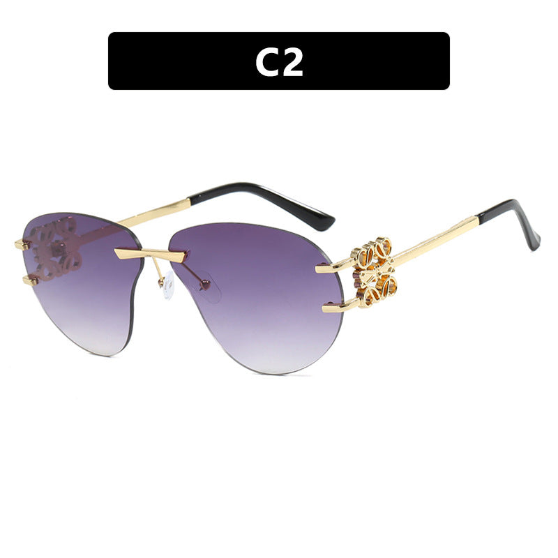 Women's fashionable sunglasses in elegant aviator style with gemstone details Stornfield