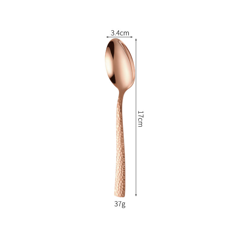 Elegant spoon with unique surface design Stornfield