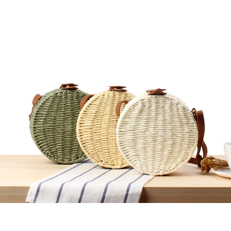 Round basket bag with leather accents Stornfield