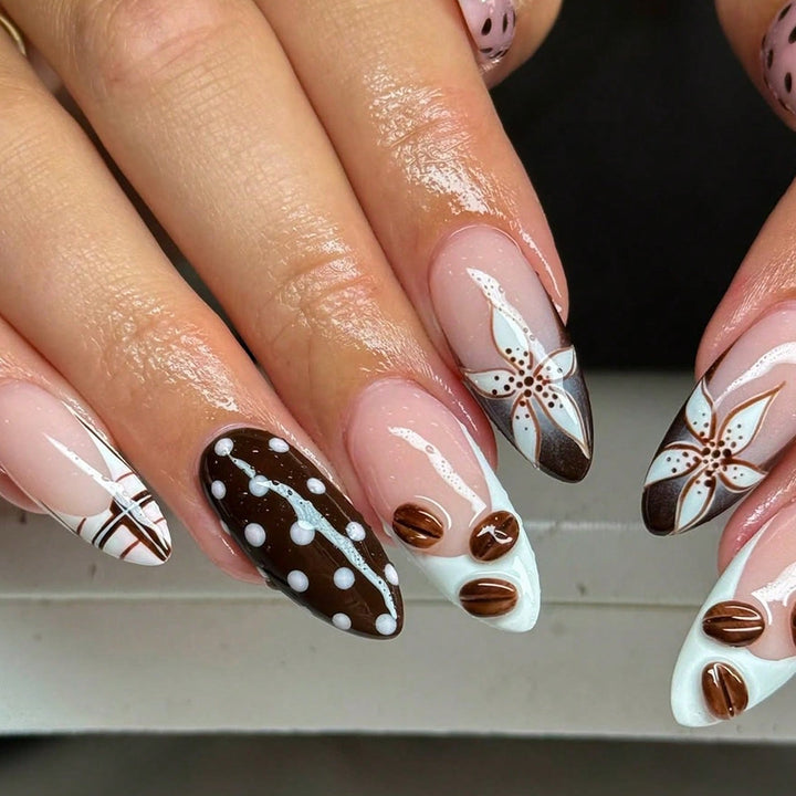 Artificial nails with elegant floral design and creative accents Stornfield