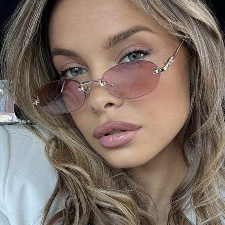 Women's fashion sunglasses with oval frame and elegant accents Stornfield